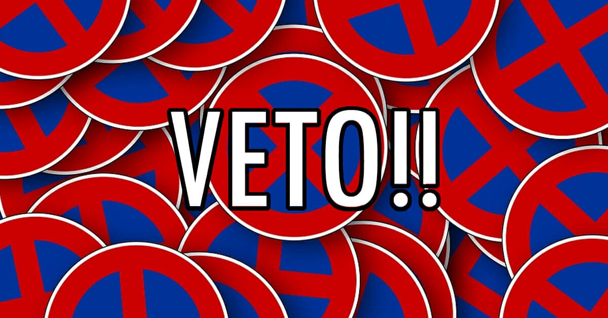 "Veto" banner.